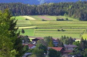 aerial view of a village and agricultural fields in Austria