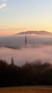 church in the morning mist in Linz