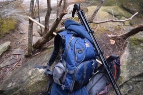 Backpack and Tripod on rock, Hiking