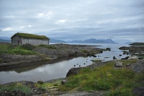 old barn by the water in Norway