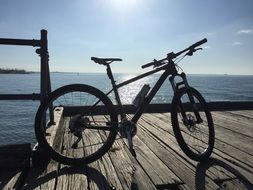 mountain bike on a wooden pier