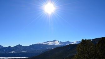 mountain range under the bright sun in colorado