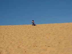 child walks in the desert