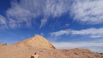 feather clouds over mountains in Egypt