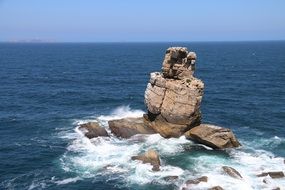 Beautiful panoramic view of the cliff at blue sky background near the coast of Peniche in portugal