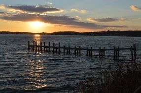 pier in the rays of sunset