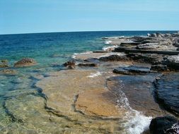 calm clear water at rocky coast, canada, Ontario, Tobermory, Bruce Peninsula national park