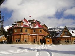 large wooden cottages in a winter ski resort