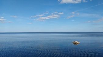 Rock in a blue ocean