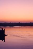 romantic pink sunset reflected in the river