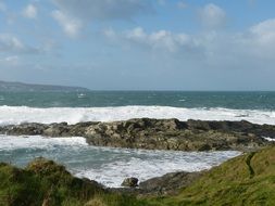 waves off the coastline of cornwall