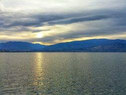 sunset on the background of the lake
