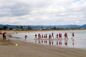 children swim in the sea