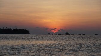 landscape of evening sky in the glow of sunset over the Maldives