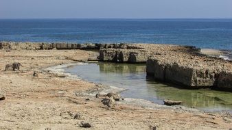 rocky beach of Makronissos