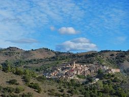 distant view of a priorat in the mountains