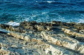 sea ​​surf on a rocky coast in croatia
