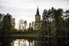 landscape of church in a green forest