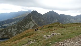 tourists rest on the top of the Western Tatras
