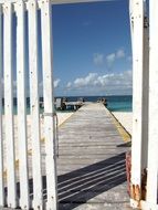 wooden pier on the beach in mexico