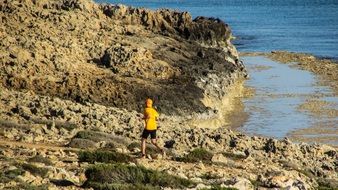 runner on the stone coast of cyprus