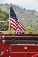 american flag on fire truck