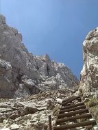 staircase among the rocks on a sunny day