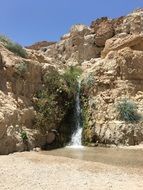 waterfall on a rock in the desert, israel, Ein Gedi