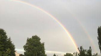double rainbow on the grey sky