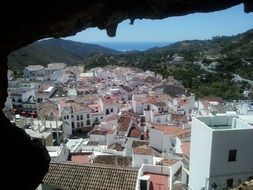 view of old city in mountain valley from Cave, spain, ojÃ©n