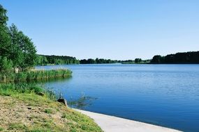 panoramic view of the lake on a summer day