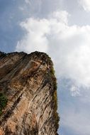 dolomite rock on a background of white clouds