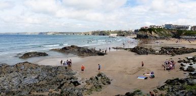 tourists on the beach on the Cornwall coast