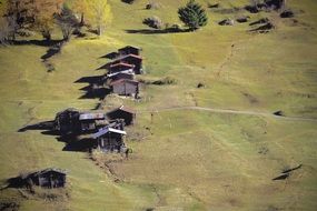 top view of barns in a meadow in switzerland