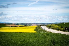 road along colorful fields in the countryside
