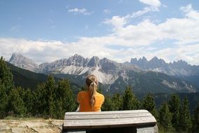 woman admiring mountains in Austria