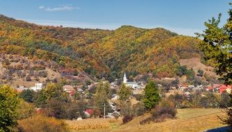 town in mountains in autumn