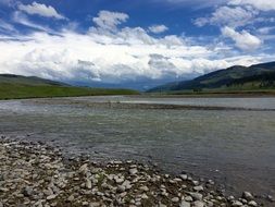 landscape of river in yellowstone national park stone