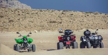 three quad bikes on the off-road
