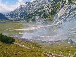 Beautiful landscape of the green valley in fog