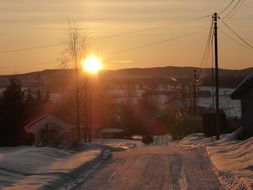 sunrise over a snowy village in norway