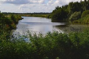 panorama of the green banks of the river in Bremen, Germany