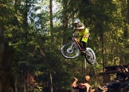 extreme motorcycle jumps in the forest