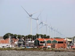 Landscape of wind turbines near the houses