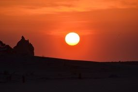Landscape with the sunrise on the coast