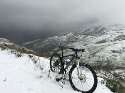 mountain bike on a snowy slope