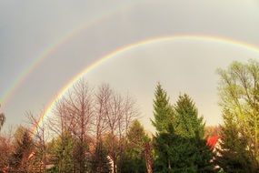 landscape of double rainbow over the village