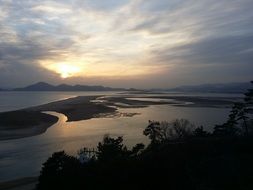 panoramic view of dadaepo beach at sunset