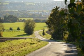 road among the picturesque landscape in the fall