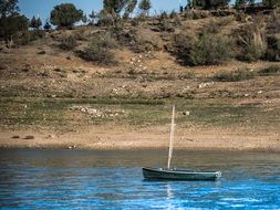 boat on bright water in axarquia in spain